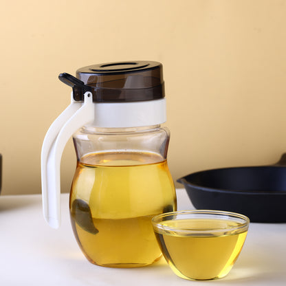 Wukusy 8127 stainless steel oil dispenser with small nozzle, 650ml capacity, featuring a sleek, durable design for kitchen use