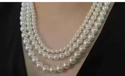 Elegant off-white pearl necklace with multiple layers from Ekom, perfect for women's fashion jewelry.