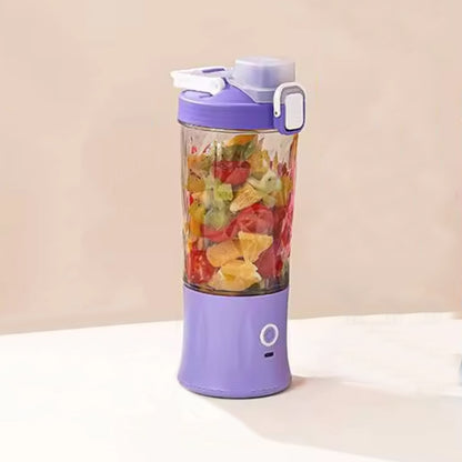 Wukusy electric juicer crusher with multicolor LED lights and 8 blades, 600ml capacity, suitable for home kitchen use.