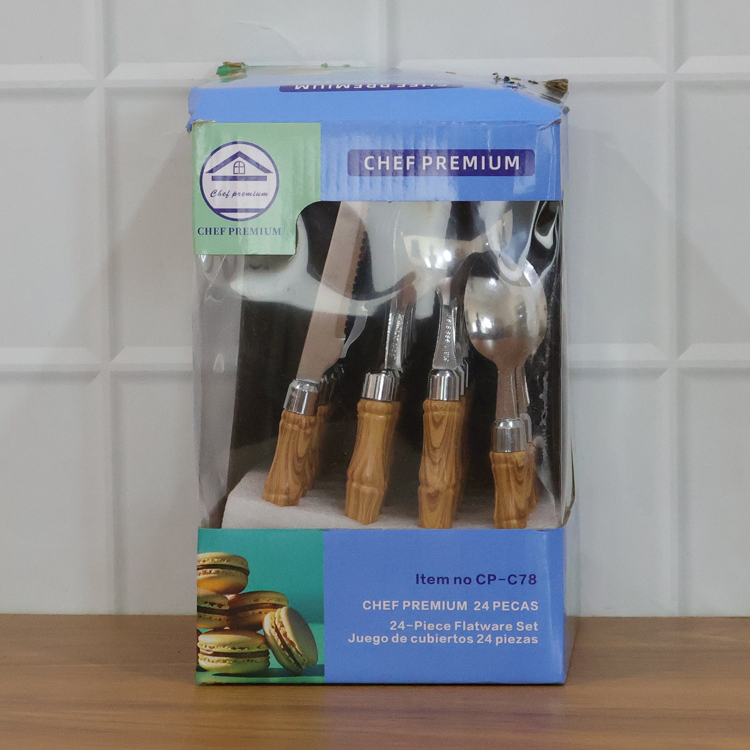 Wukusy stainless steel cutlery set with wooden finish handles, 24-piece set including forks, knives, spoons, and serving utensils