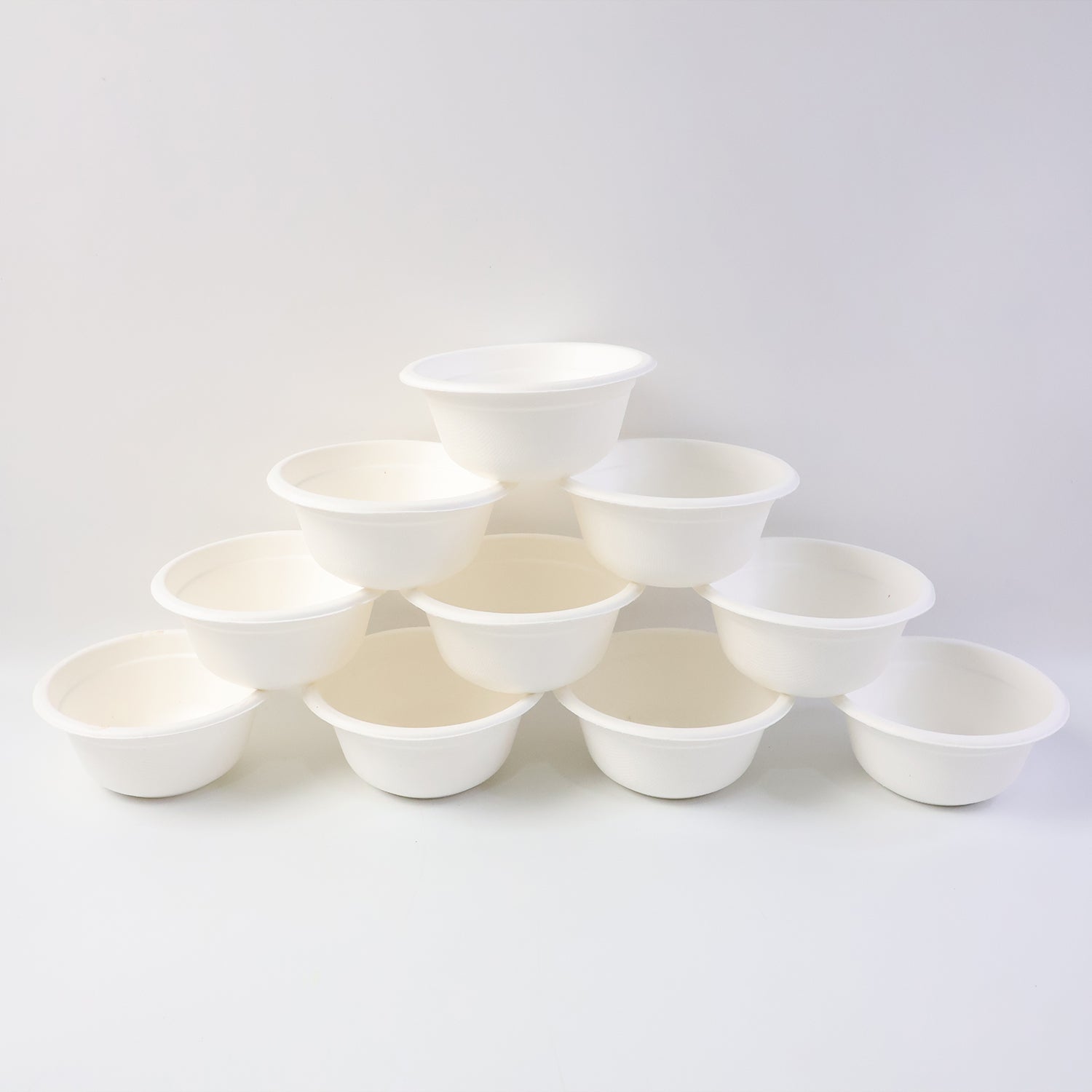 Set of 10 Wukusy Freshee 240ml compostable bagasse bowls for home and kitchen use, eco-friendly and biodegradable.