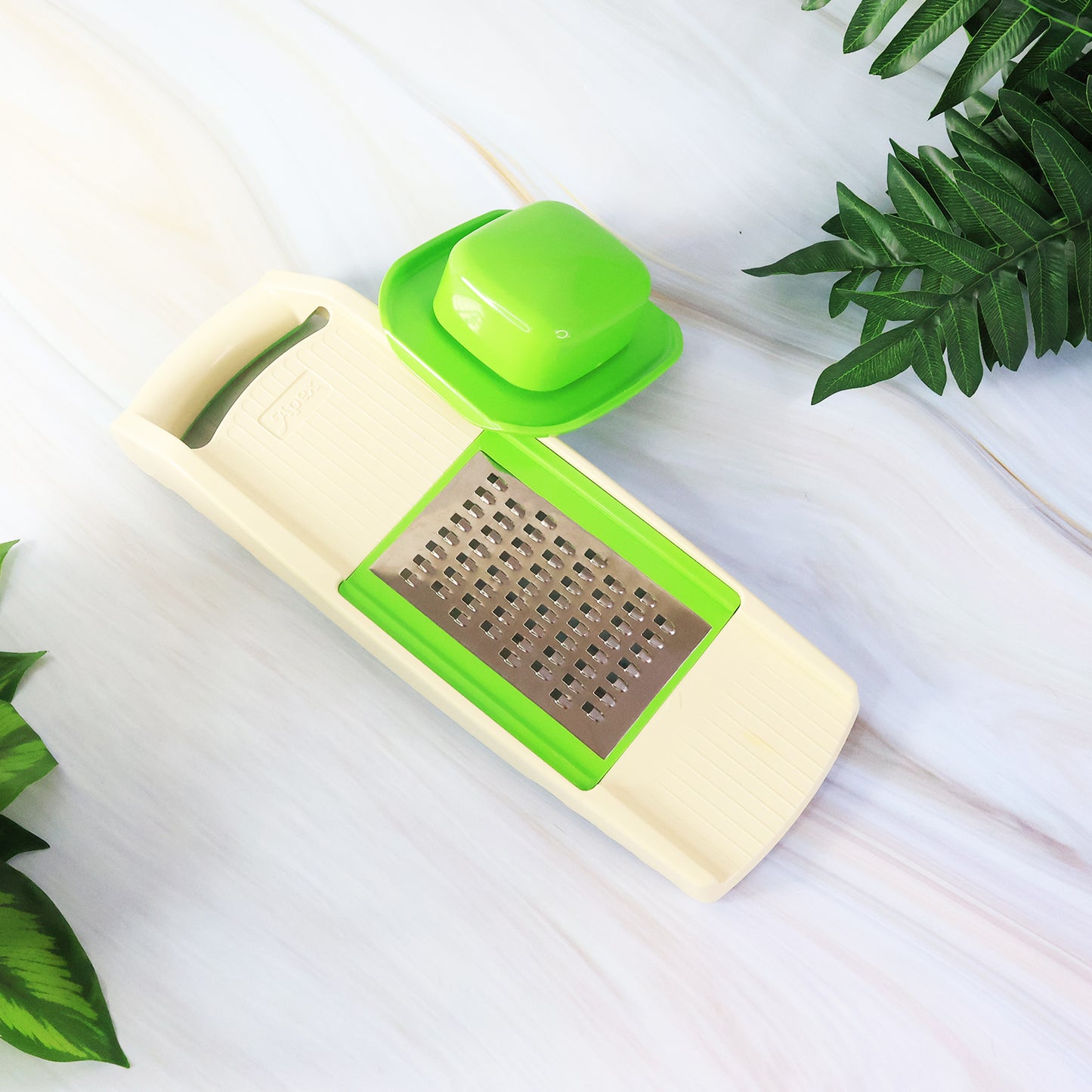 Wukusy Supermom Quick 6-in-1 multipurpose slicer for home and kitchen use, featuring stainless steel blades and adjustable settings.