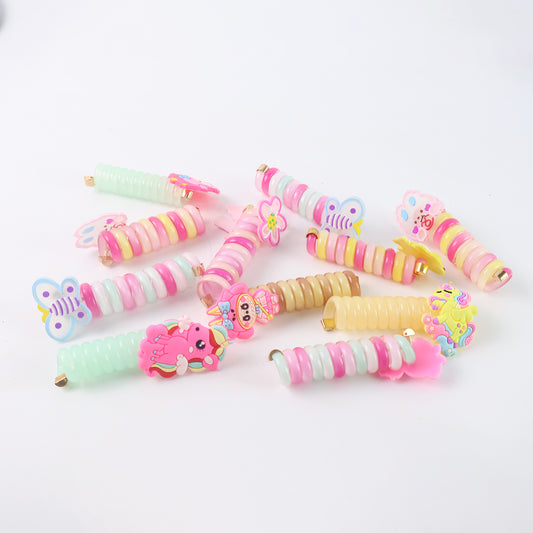 Set of 12 Wukusy spiral hair braiding clips for kids with mixed designs, perfect for easy, stylish hair styling.