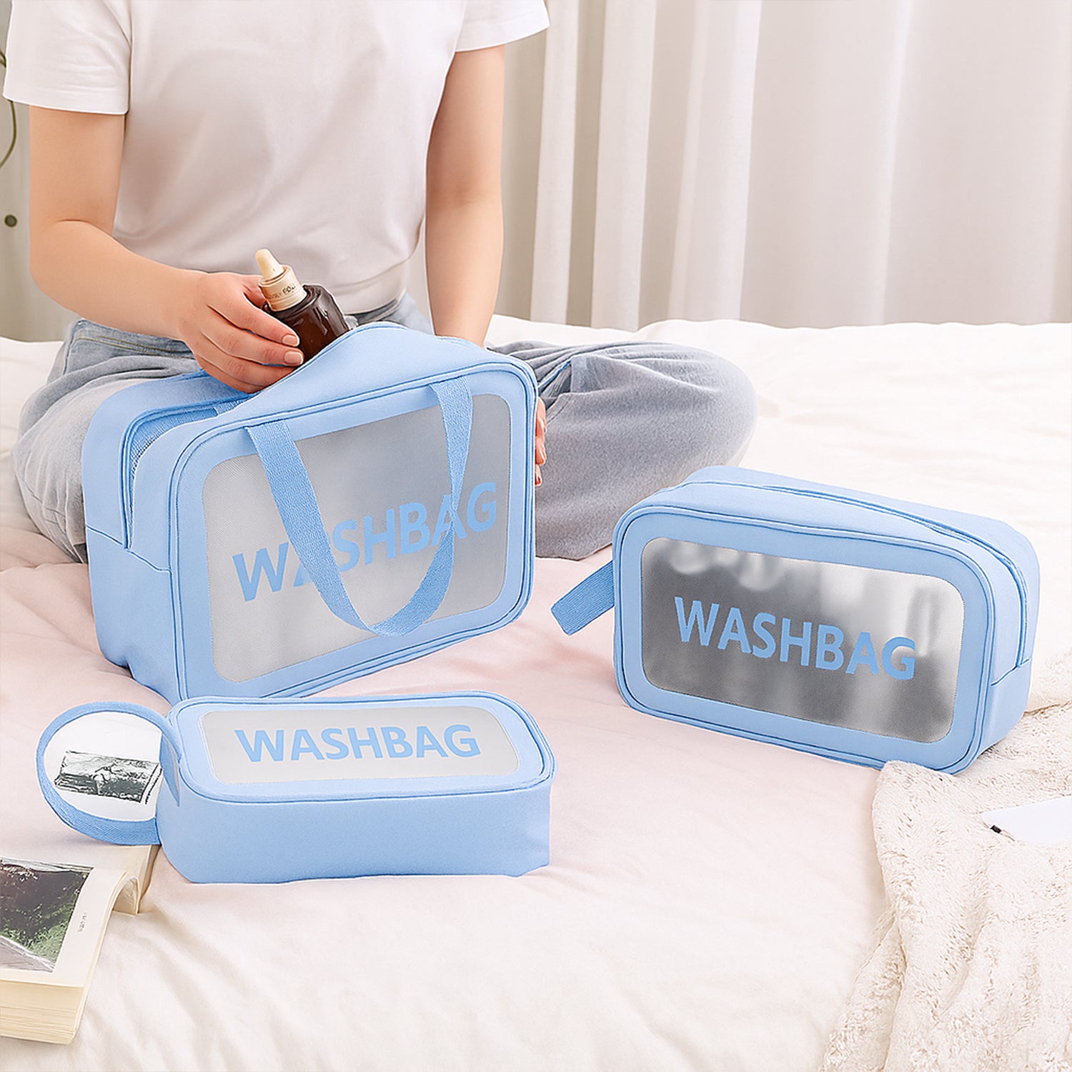 Transparent Wukusy 3-in-1 waterproof travel toiletry bag set with multiple compartments for toiletries and personal items.