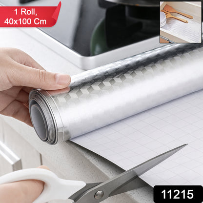 Wukusy aluminium foil paper roll for kitchen wrapping, food storage, cooking, and baking, shown unrolled on a kitchen surface.