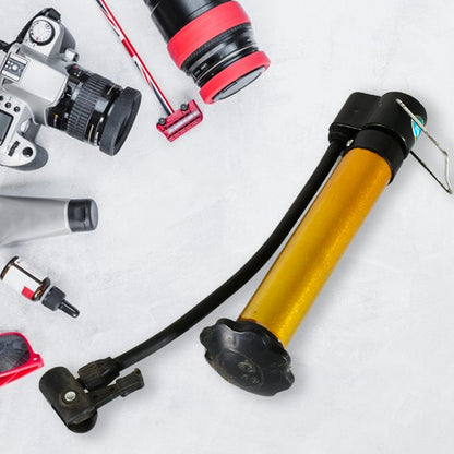 Wukusy 8506 hand air ball pump with metal body, portable high-pressure inflator for basketball, soccer, volleyball, and football.