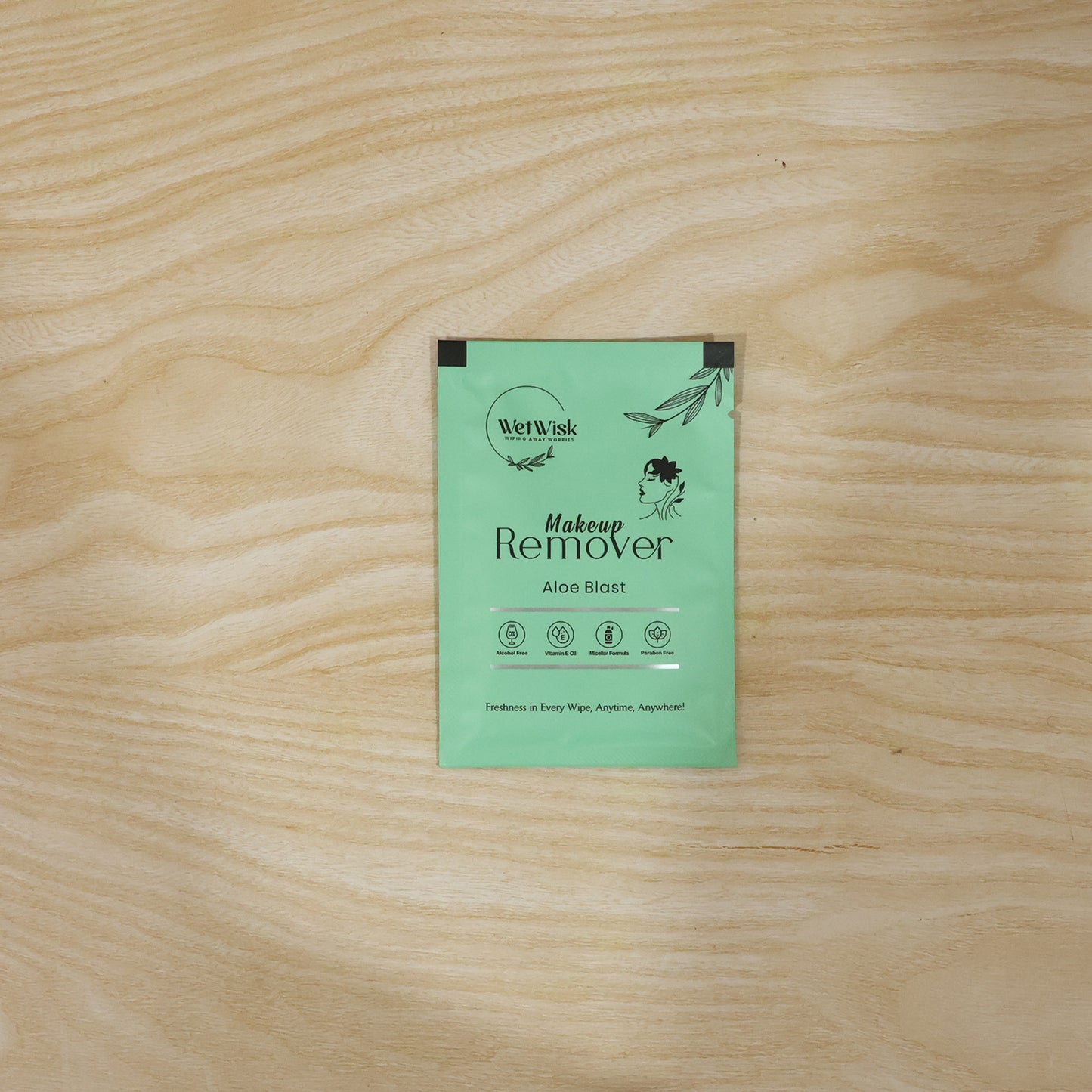 Wukusy makeup remover wet wipe for facial cleansing, showing the soft, moist wipe with gentle cleansing properties.