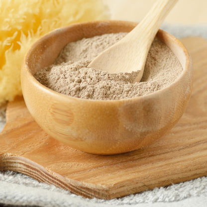 Wukusy Natural Multani Mitti fullers earth face and body care powder in a 10-12g packet for skin cleansing and rejuvenation.