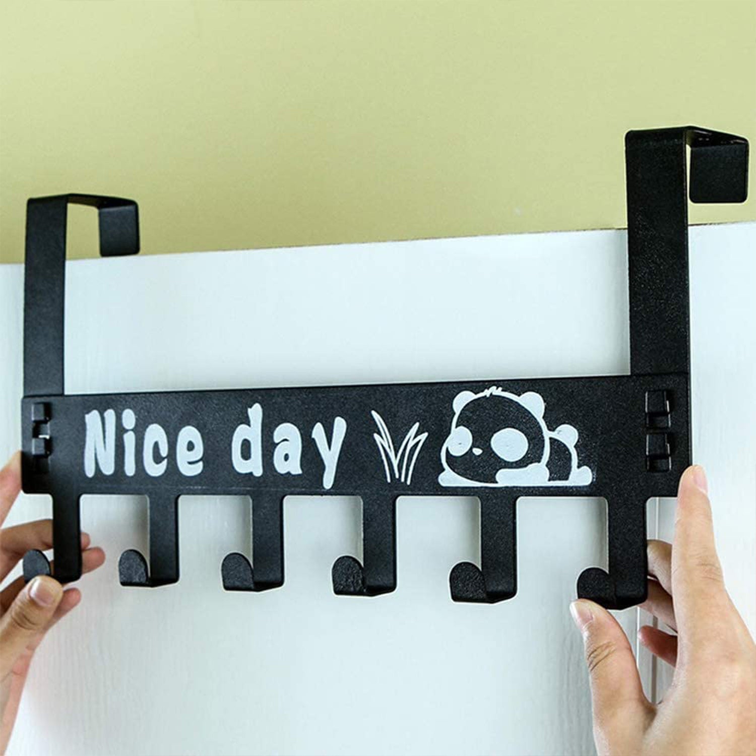 Wukusy heavy-duty carbon steel cartoon-themed over door hook rack with six hooks for towels coats scarves and clothing.