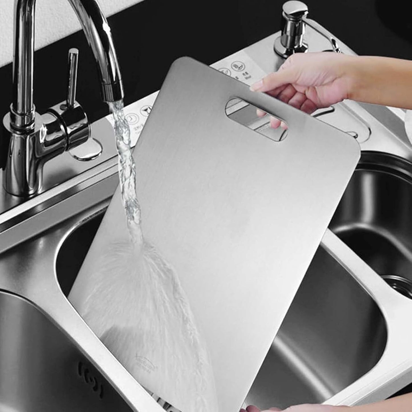 Wukusy Supermom Medium Stello stainless steel chopping board with a sleek, reflective surface for kitchen food prep.