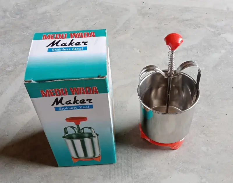 Ekom Medu Wada Vada donut maker dispenser for kitchen, stainless steel tool for preparing traditional Indian snacks.