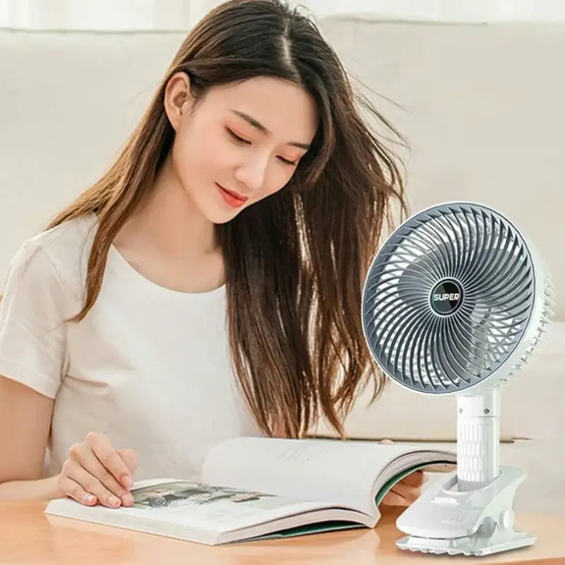 Ekom portable USB fan for handheld and desktop use, compact, rechargeable, plug-and-play cooling fan for home improvement.