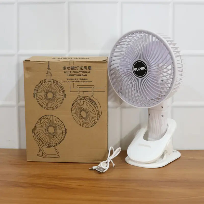 Ekom portable USB fan for handheld and desktop use, compact, rechargeable, and easy to plug in for cooling and home improvement.