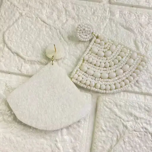 Cone-shaped handmade beaded earrings by Ekom, featuring colorful beaded design, perfect for fashion jewelry and stylish accessories.