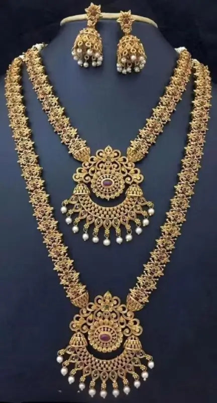 Ekom Princess Unique jewelry set featuring gold-plated alloy haram and earrings with pearls, adjustable for a stylish look.