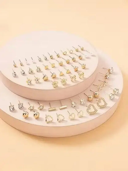 Gold plated multicolor pearl and AD stud earrings from Ekom jewelry, featuring a set of 30 pairs of stylish stud earrings.