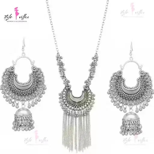 Ekom silver partywear necklace and earrings set with oxidised finish, bold design for women, jewelry and watches collection.