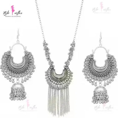 Ekom silver partywear necklace and earrings set with oxidised finish, bold design for women, jewelry and watches collection.