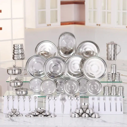 Ekom KIARAA 61-piece stainless steel dinner set with plates, bowls, and utensils for elegant kitchen and dining use.