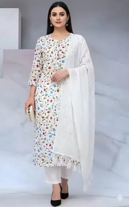 White printed cotton kurta set for women with matching pants and dupatta, by Ekom, in XXS to XXXL sizes.
