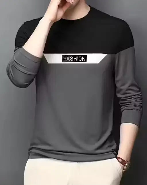 Men’s grey Ekom cotton blend full sleeve printed T-shirt with round neck, available in S to XXL size.