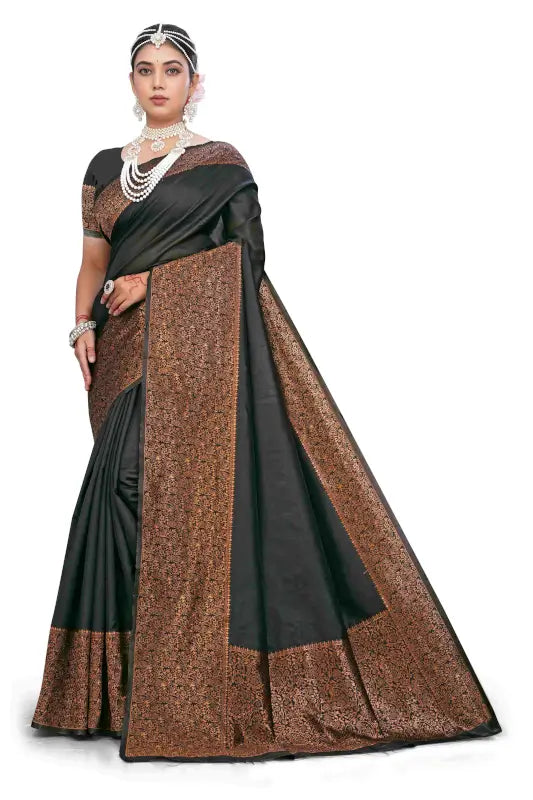 Elegant black silk saree from Ekom's Royal Black Copper Zari Collection, showcasing intricate zari work and traditional women's attire.