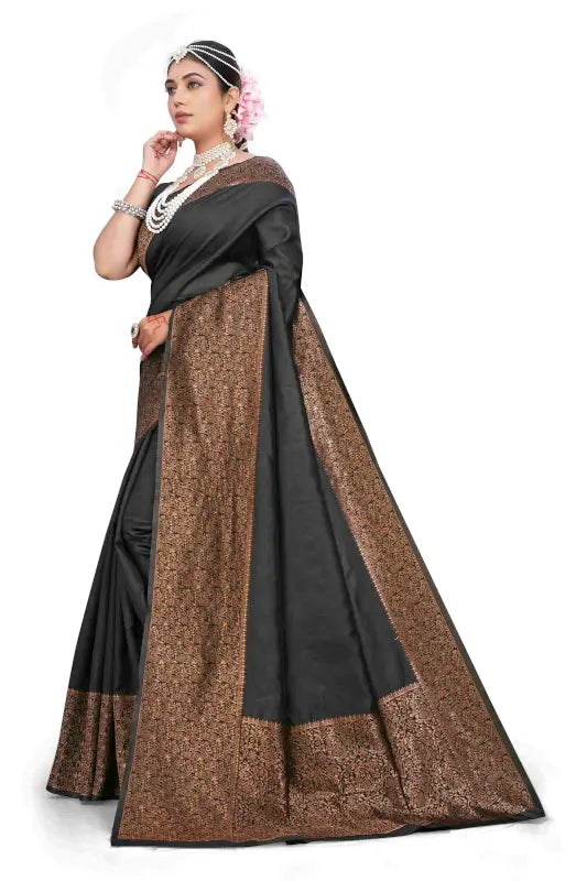 Elegant black silk saree from Ekom's Royal Black Copper Zari Collection, featuring intricate zari work for women.