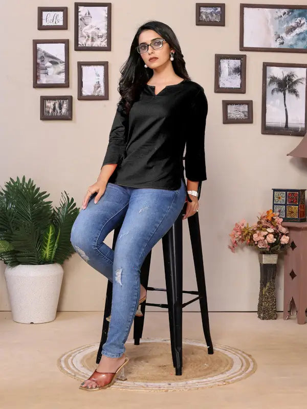 Baby pink cotton women's tunic with round V-neck, hip length, 3/4 sleeves, by Ekom, displayed on a model.