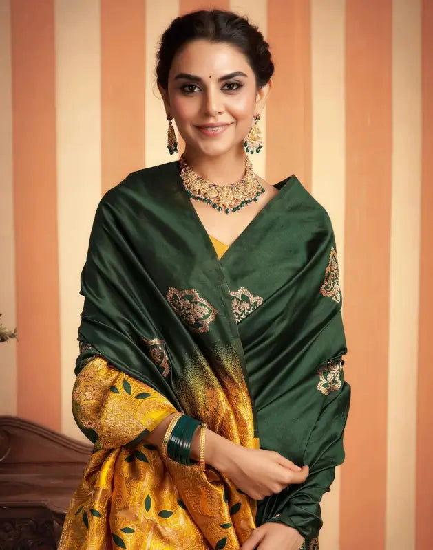 Elegant green and gold silk saree for women from Ekom's Royal Green Golden Elegance Collection, showcasing intricate woven patterns.