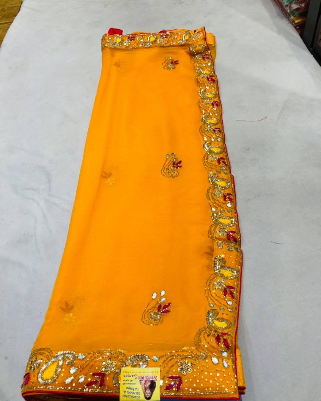 Elegant women's saree featuring intricate embroidery, cording, and sequin work in a beautiful design from Drpshippr's collection.