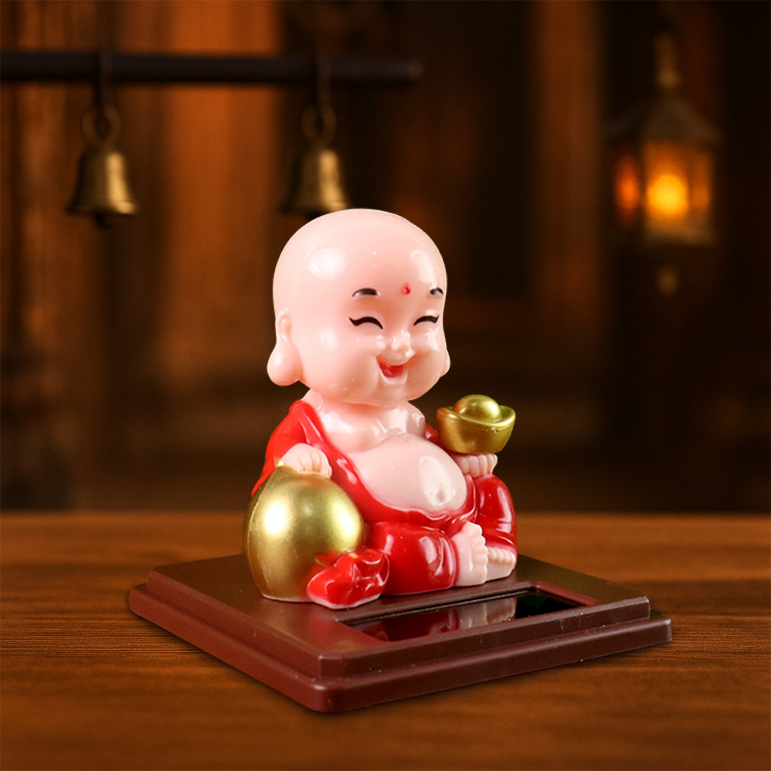 Wukusy solar-powered moving head Buddha statue car ornament in mixed colors, designed to attach to vehicle dashboards or dashboards.