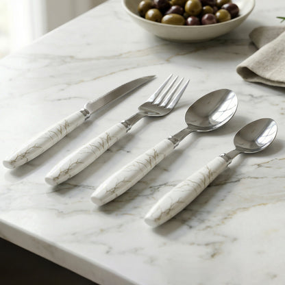 Wukusy stainless steel cutlery set with 4 pieces featuring elegant marble design handles, including forks, knives, and spoons.