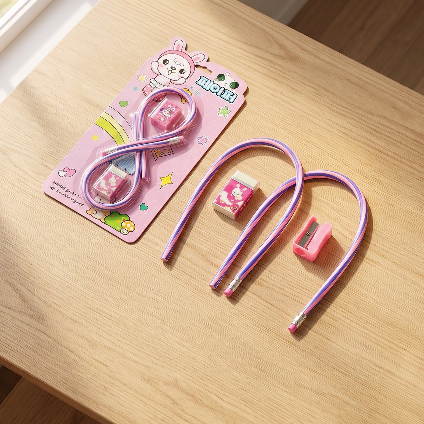 Kids school stationery set by Wukusy with flexible pencils, eraser, and sharpener in a colorful, organized 4-in-1 kit.