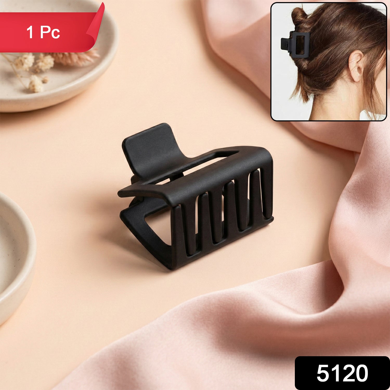 Wukusy premium matte finish strong hold hair claw clip holding a section of dark hair, showcasing its sturdy design and matte texture.
