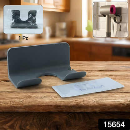 Wukusy wall-mounted hair dryer holder, single black plastic and metal bracket for organizing hair styling tools.