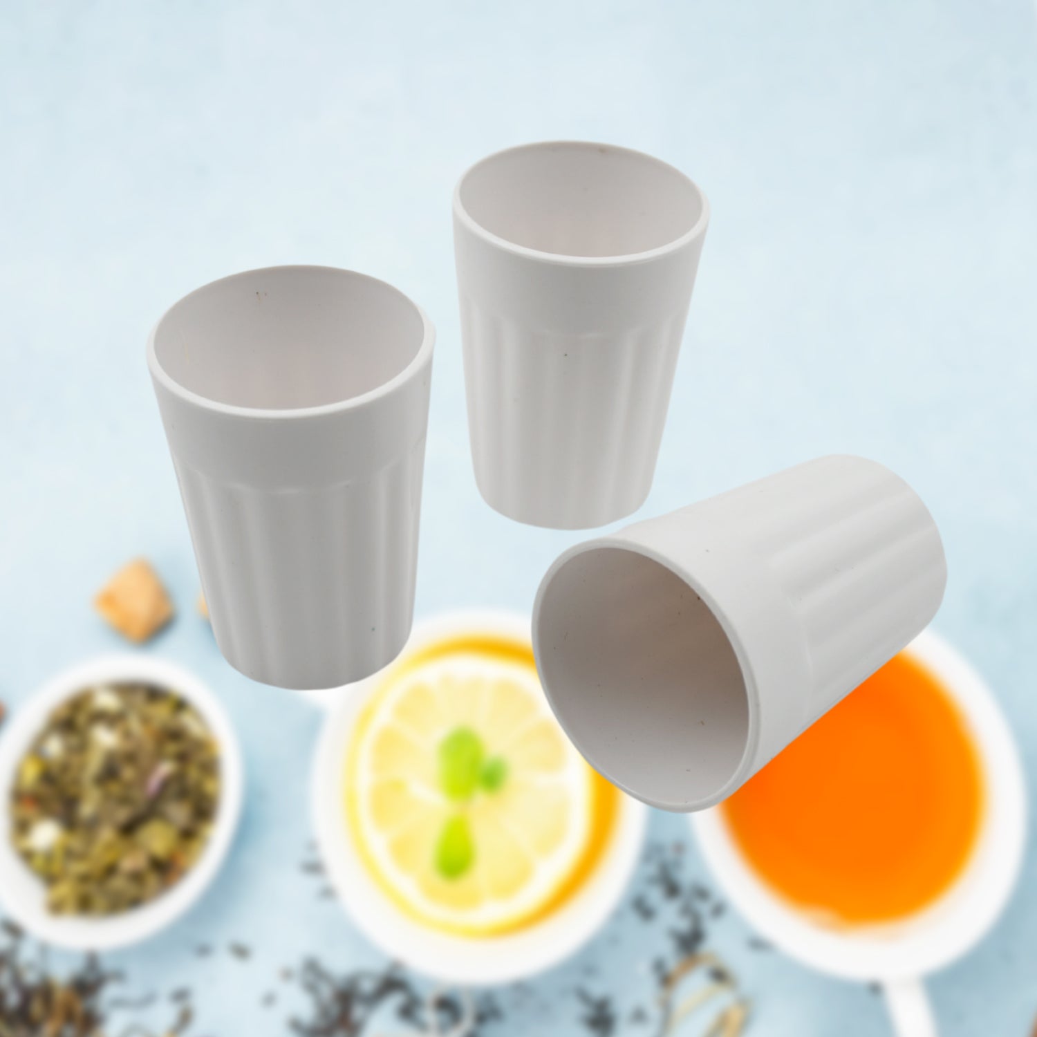 Set of three Wukusy small plastic coffee and tea cups, reusable, lightweight, microwave and dishwasher safe camping mugs for hot and cold drinks.