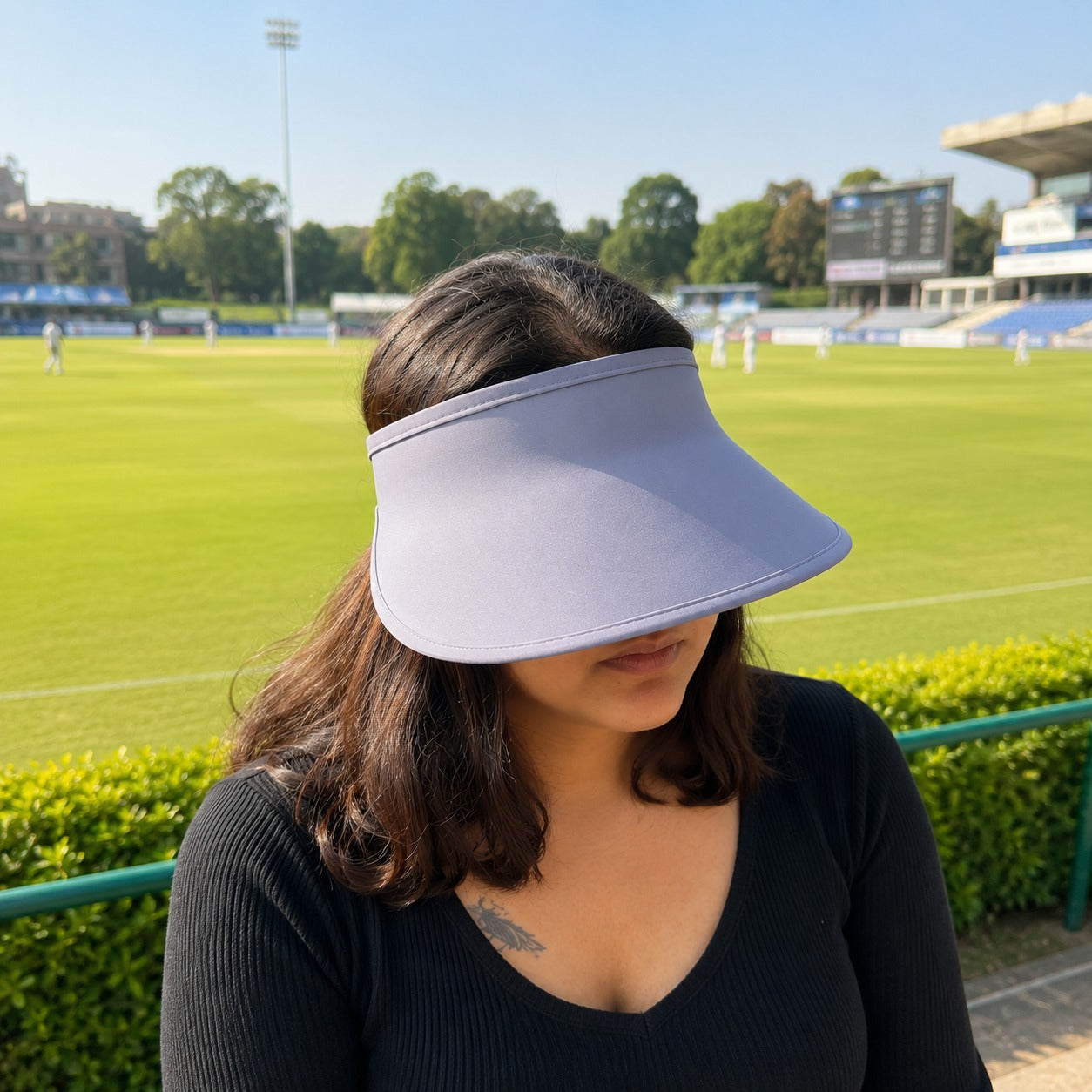 Wukusy women's adjustable wide brim sun visor cap for outdoor summer wear in a random color, wide brim and lightweight design.