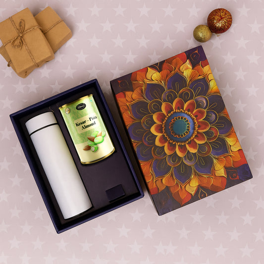 Effete Kesar Pista Almonds gift hamper with golden accents and a bottle, featuring Wukusy branding, suitable for home and kitchen gifting.