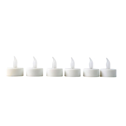 Six Wukusy LED flameless tealight candles in warm light, perfect for home decor and creating cozy ambiance.