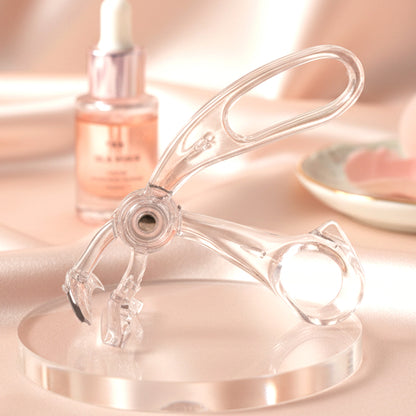 Wukusy classic plastic eyelash curler with black handles and metal curling pad for natural, long-lasting lash curl.