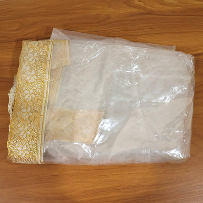 Clear PVC table cover measuring 87x59 inches from Wukusy, showing a smooth, transparent protective surface on a dining table.
