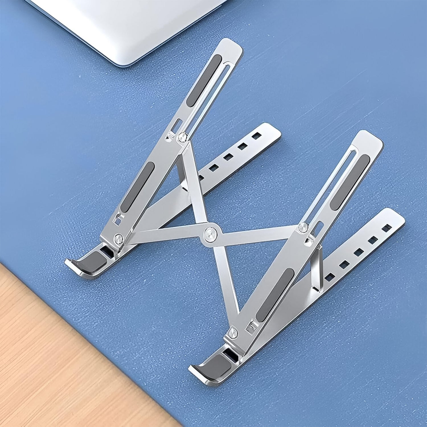 Wukusy foldable height-adjustable laptop stand for home use, featuring a sleek design and multiple height settings.