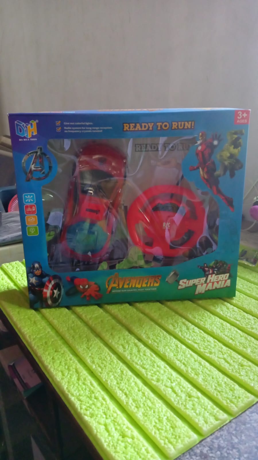 Wukusy plastic remote control racing car with handle, featuring forward and backward functions, rechargeable battery, designed for kids.