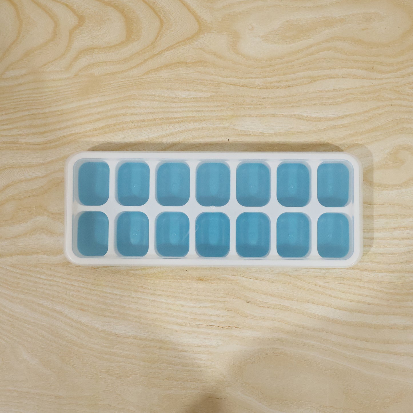 Blue Wukusy multipurpose plastic ice cube tray with lid, 14-grid design, perfect for freezing ice cubes or other small items.