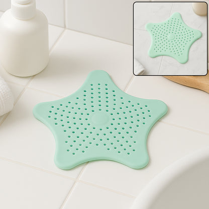 Mint green silicone star-shaped sink filter by Wukusy, bathroom hair catcher and drain strainer for basin.