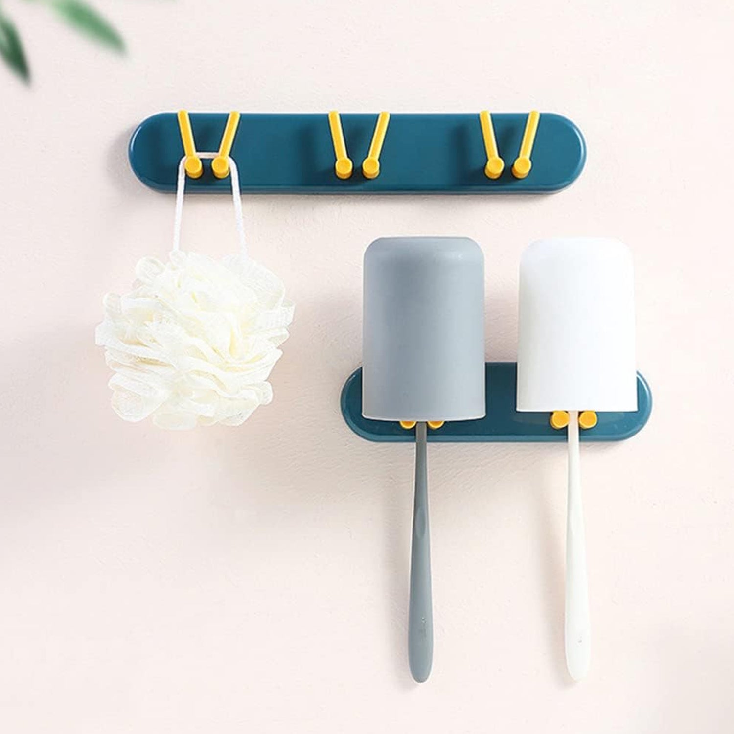 Plastic toothbrush holder and bathroom organizer wall-mounted with hooks, by Wukusy, for bathroom storage and organization.