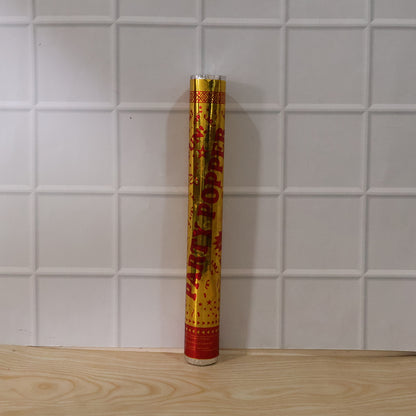 Wukusy golden party popper confetti cannon for birthdays and celebrations, ready to shoot colorful confetti in the air.