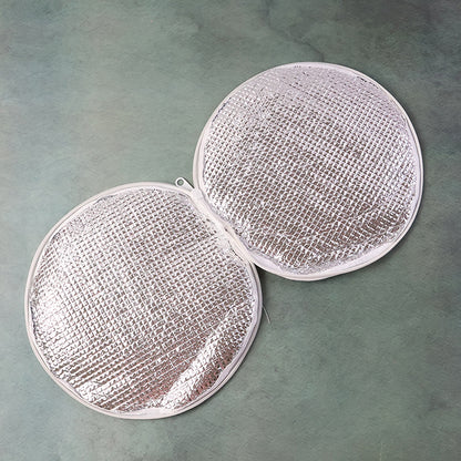 Wukusy insulated roti cover, 23x23 cm, for keeping rotis warm, shown on a table with bread inside