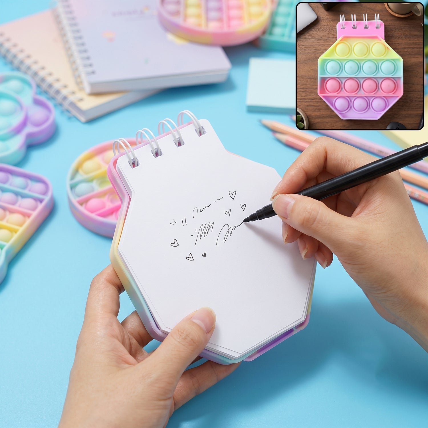 Pastel hexagon fidget diary by Wukusy with pop bubble sensory bubbles for kids, featuring a colorful and playful notebook design.