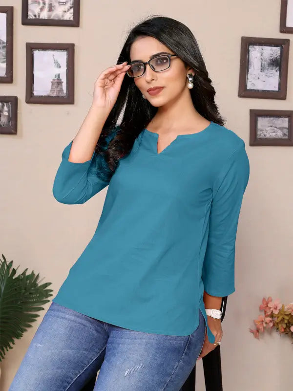 Women’s pink cotton V-neck tunic with 3/4 sleeves, hip length, from Ekom, featuring a round neckline and casual style.